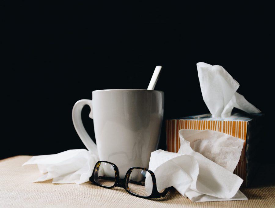 Cup of tea with box of tissues